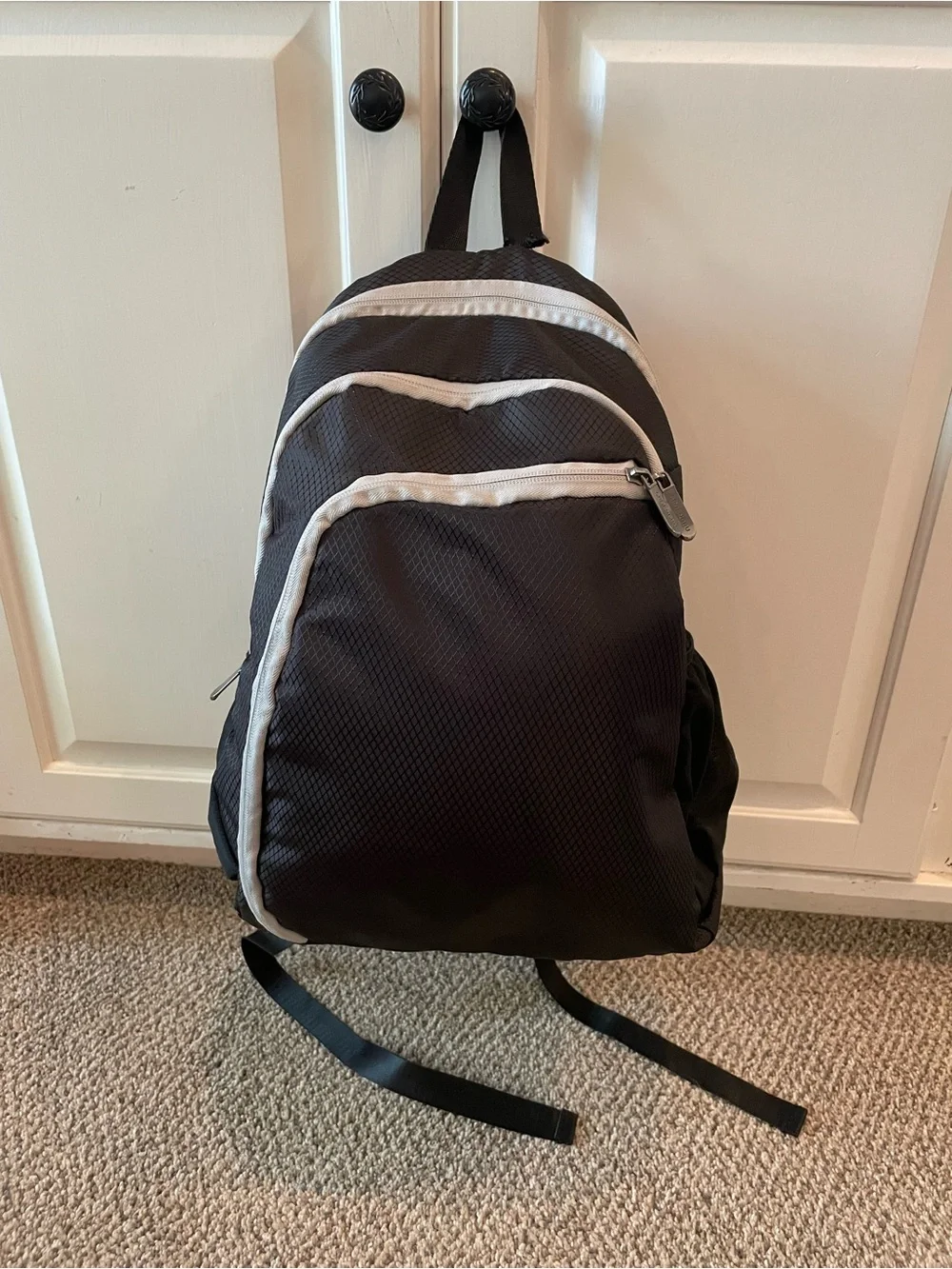 Spoengru Black Backpack with Gray Trim and Multiple compartments